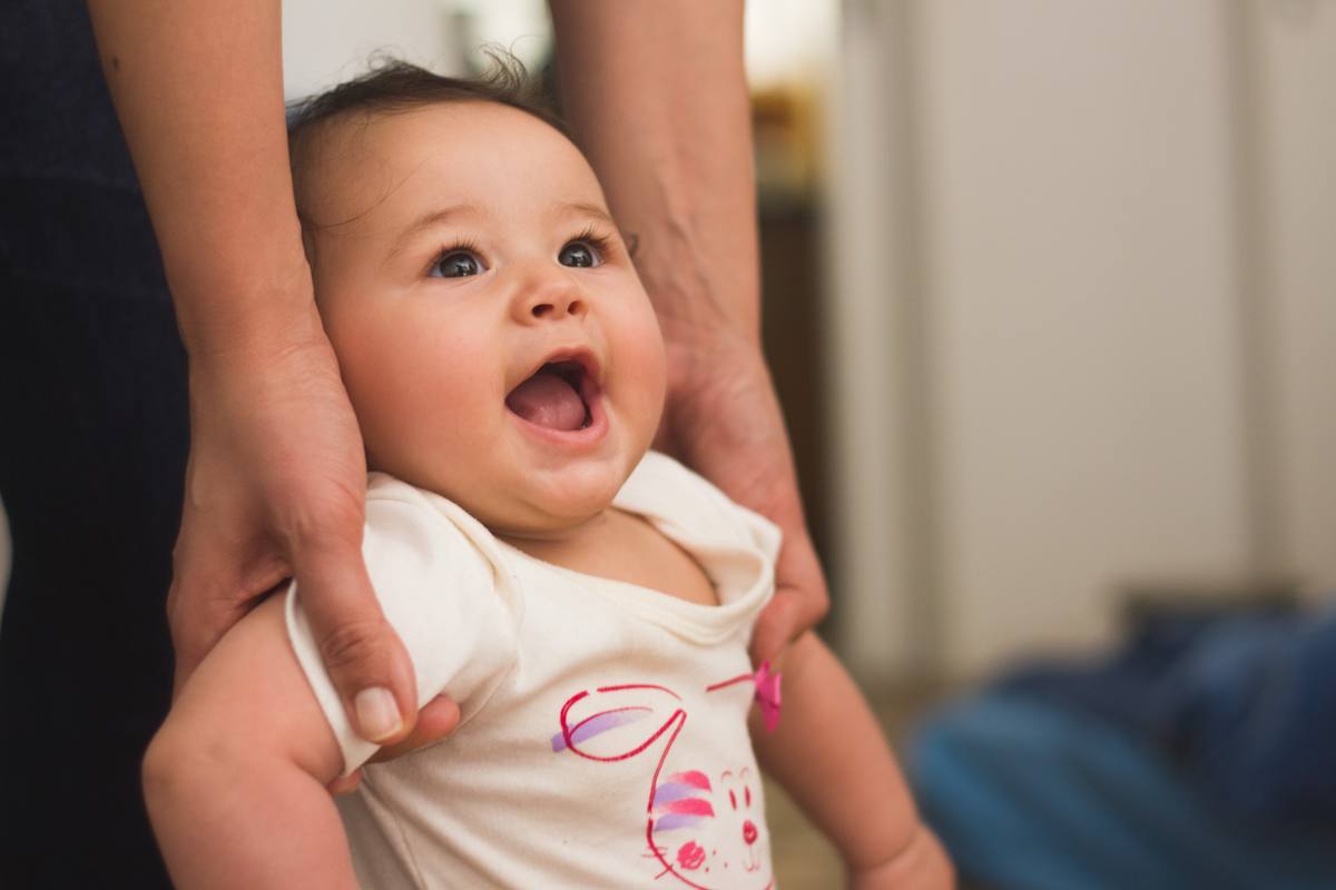 Mariana with her parents at home